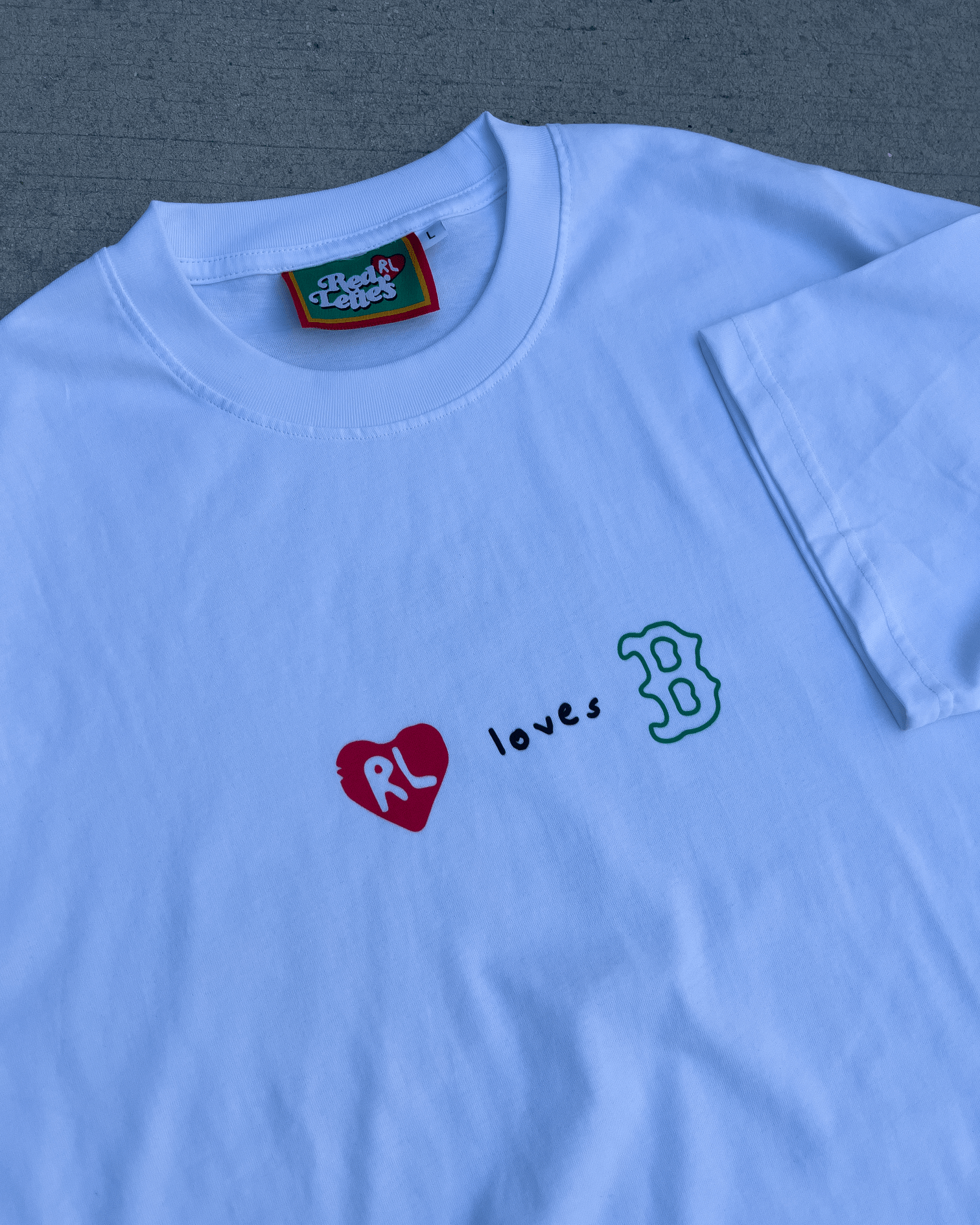 At The Garden Tee - Red Letters